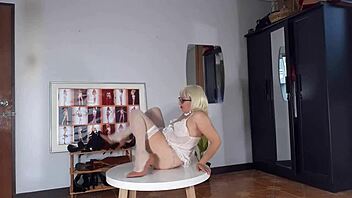 Wow, Regina Noir’s Striptease In White Lingerie And Stockings Is Hot!