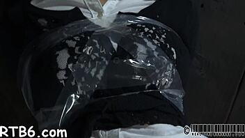 Cute lass waits for lusty domination in bondage.