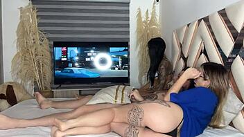 My best friend worships my boyfriend's big ebony cock during movie night