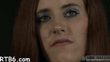 Cute lass waits for lusty domination in bondage.