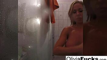 Sensual pierced beauty Olivia Austin cleans up after a day