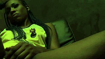 In this intense scene, the ebony beauty engages in passionate sex, her shaved pussy glistening with desire.