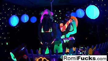Romi Rain and Dani Daniels in Lesbian Black-Light Fun with Big Tits and Asses
