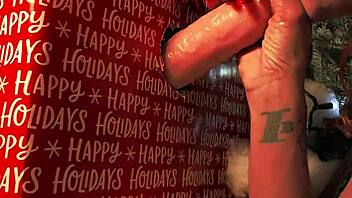 Masturbating with a big cock shaped Christmas present