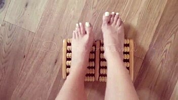 Enjoying a relaxing foot massage session at home