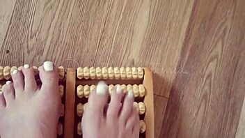 Massage with the help of bare feet and feet massage