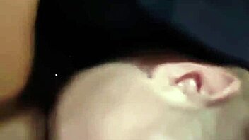 The slut bends over, licks his cock, sucks it deep, then gets fucked in doggystyle