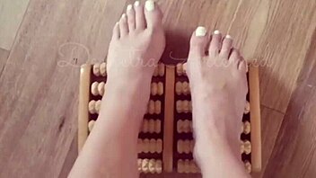 Enjoying a relaxing foot massage session at home