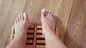 Enjoying a relaxing foot massage session at home