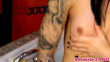 this solo shemale jerks off in the bath, feeling so good