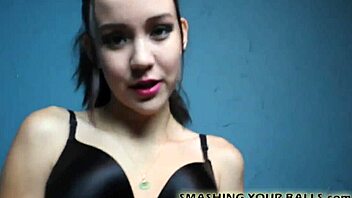 Sadist kicks balls in bondage scene