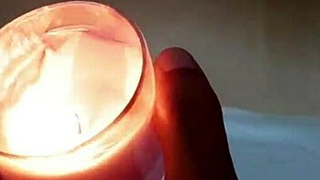 Young couple enjoys hot candle massage with oil and plenty of sex in a motel room.