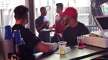 Two Firefighters, Michael Boston And Dillon Diaz, Interact In The Club