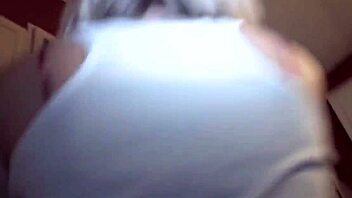 Coed lesbians tease and dildo each other at university party while everyone watches