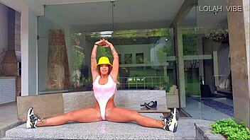Hot and sexy Lola Vibe teaches stretching class.