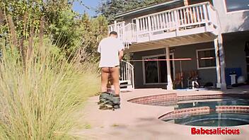 Blonde cheerleader gets fucked outdoors by two guys.