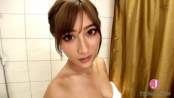 Asian beauty enjoys a solo pleasure session with her body parts.