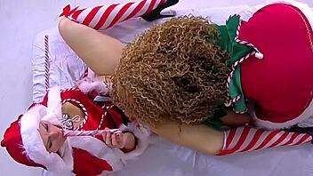 Nadia White spanks Nins Rivera hard for Christmas domination play