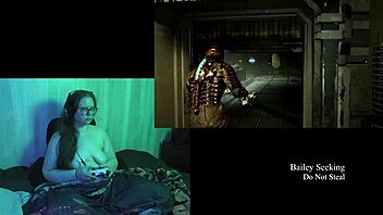 Naked brunette plays deadspace game part three