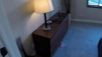 Busty Brett Rossi teases in her motel room