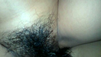 In a hotel room, a peruvian woman screams during intense moments.