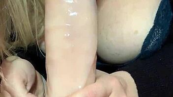 my slut wife sucks and tit fucks a big dildo.