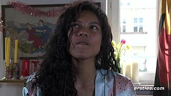 A beautiful black amateur masturbates on the balcony.
