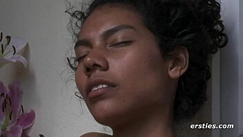 A beautiful black amateur masturbates on the balcony.