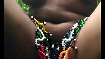 msanzi ebony model poses in lingerie outdoors