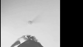 Watch the naughty latina neighbor shake her big ass in lingerie from the window.