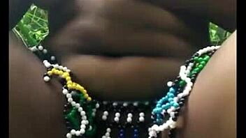 msanzi ebony model poses in lingerie outdoors