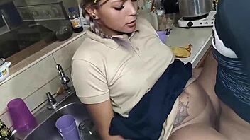 Stepfather and stepdaughter have an affair in the kitchen.