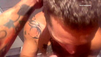 Gay guys cruise in gym shower for blowjobs and masturbation.