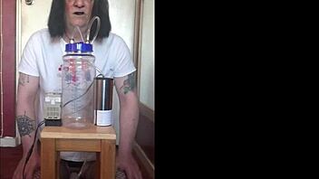 An amateur crossdresser who is not ashamed to show off his lactating body and his portable cow milking machine.