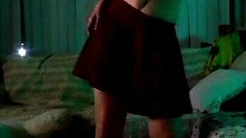 Latina brunette noita dances seductively.