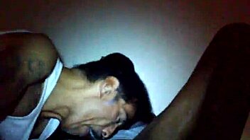 Guy enjoys sucking on a big black cock