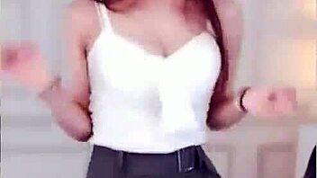 Korean girl performs a sexy dance in the cold weather.