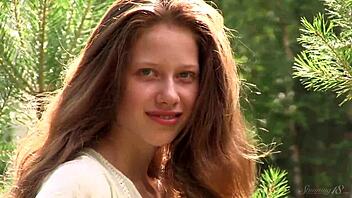 Nicole Embraces Nature Naked in Sexy Outdoor Display