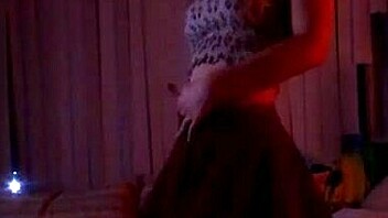 Latina brunette noita dances seductively.