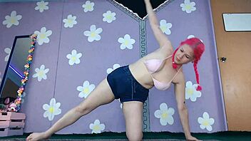 I’m a cute milf flashing pierced nipples in bikini yoga workout.