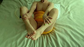 Lana wears a yellow dress and masturbates her pussy while she is alone at home.