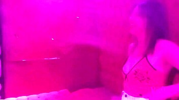 Blonde babe with small tits gives handjob to stranger in bar while cuckold husband films.