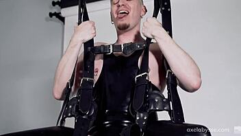 french gay dude gets double fisted while suspended in wild scene.