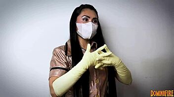Nurse In Hospital Layers Latex Gloves For Femdom Fetish With Patient