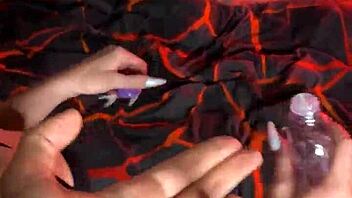 She sucks his cock in stockings while fingering herself