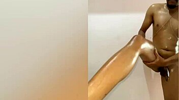 watch this deepthroat gagging with choking and sloppy facial on oiled gay dildo toys?