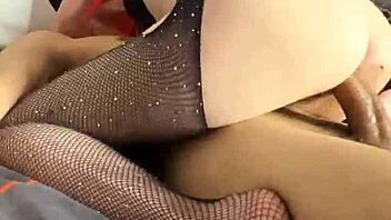 She sucks his cock in stockings while fingering herself