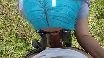 A vulgar student performs a blowjob in a public park