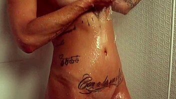 A big tits homemade brunette gets a bath time orgasm with a dildo