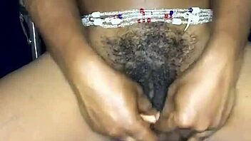 Watch this sexy ebony from Ghana satisfy herself with a dildo in her anal and pussy holes!